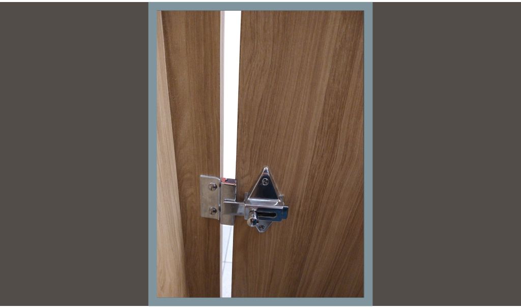 Toilet partition door with large gap at edge