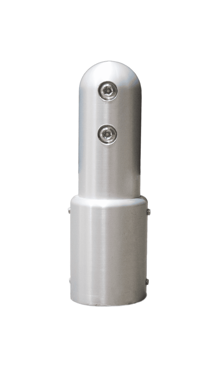A metallic cylindrical object resembling a pedestal features two screw holes on the upper section.