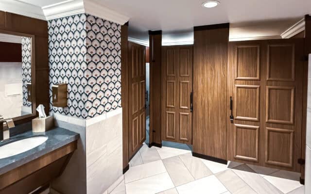 Floor To Ceiling toilet partitions in plastic laminate for a hospitality application.