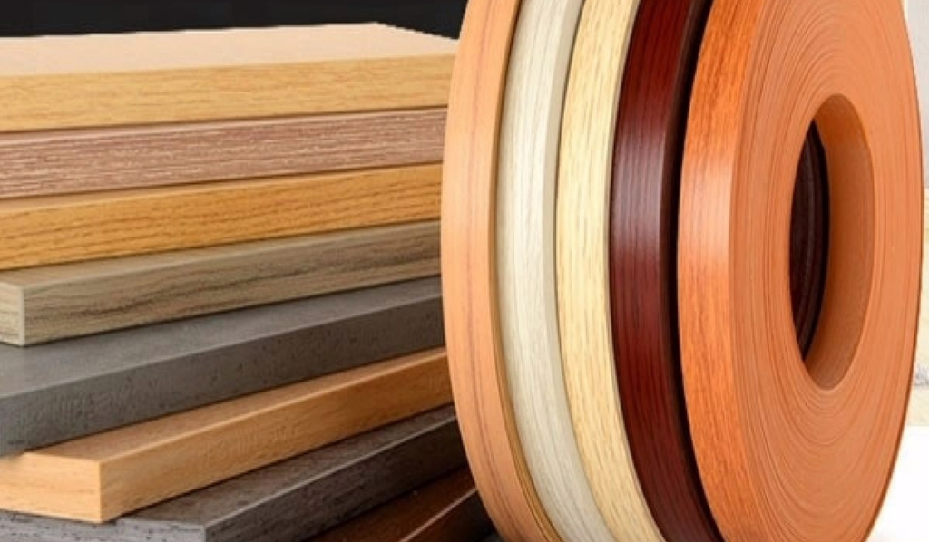 A variety of different colored edge band strips showcasing edge banding material. 